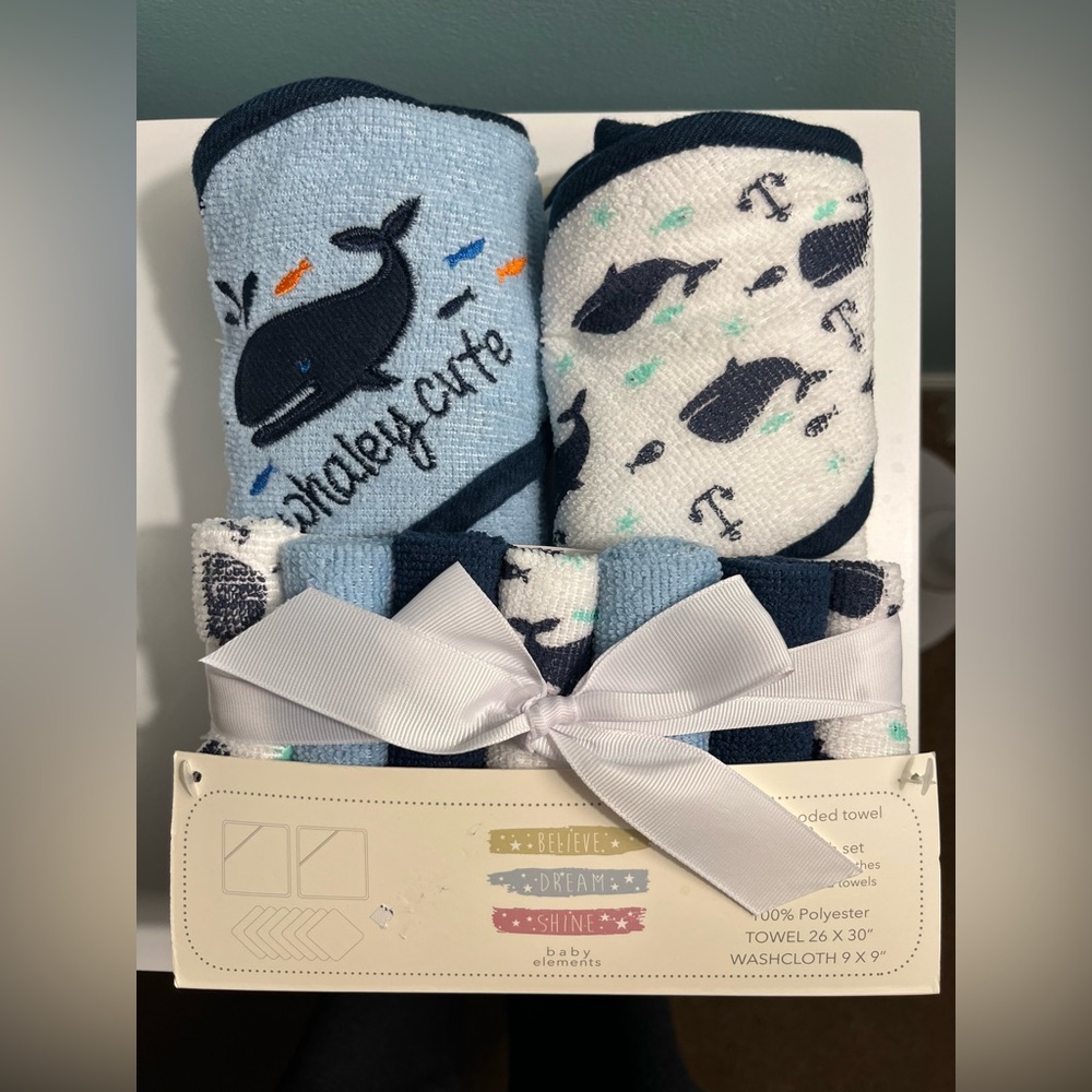 NEW. 9 pc hooded baby boy towel set.
